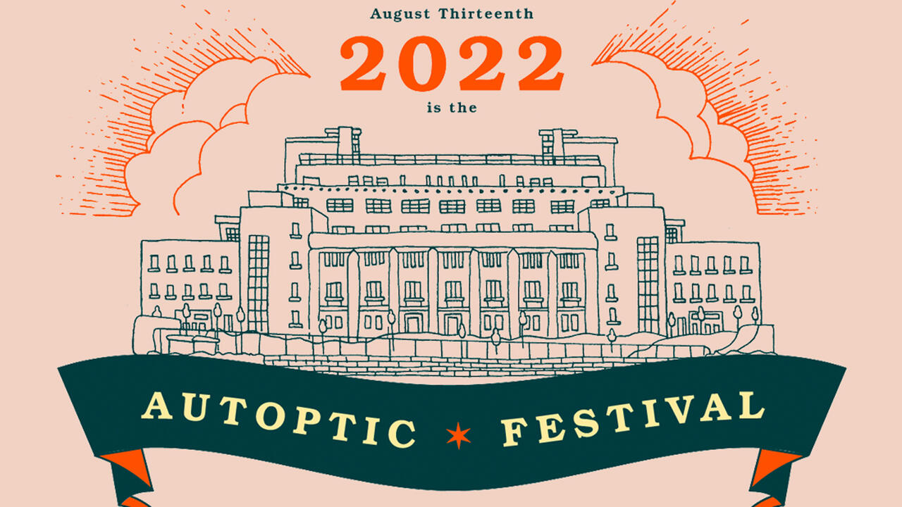 Text at the top read "August 13th 2022 is the" then in the middle of the image there is a large drawing of a building and at the bottom in a green ribbon there is text that reads " AUTOPIC FESTIVAL" The background of the image is a light orange color