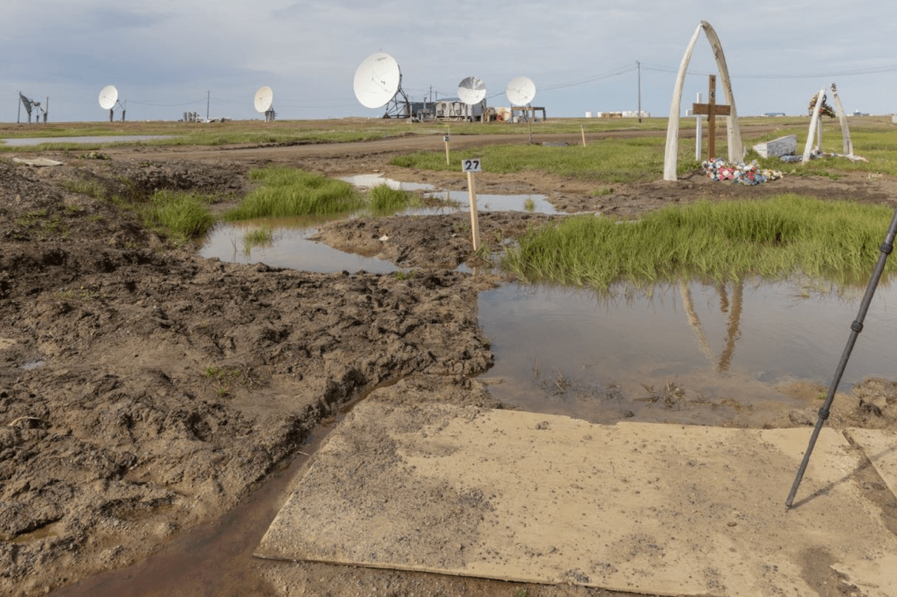 Steve Rowell. Thawing ponds and grave sites in Utqiagvik (Barrow), AK.