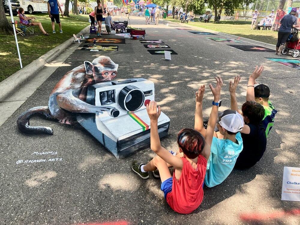 Shawn McCann Leads Chalk Art Extravaganza at St. Louis Park's West