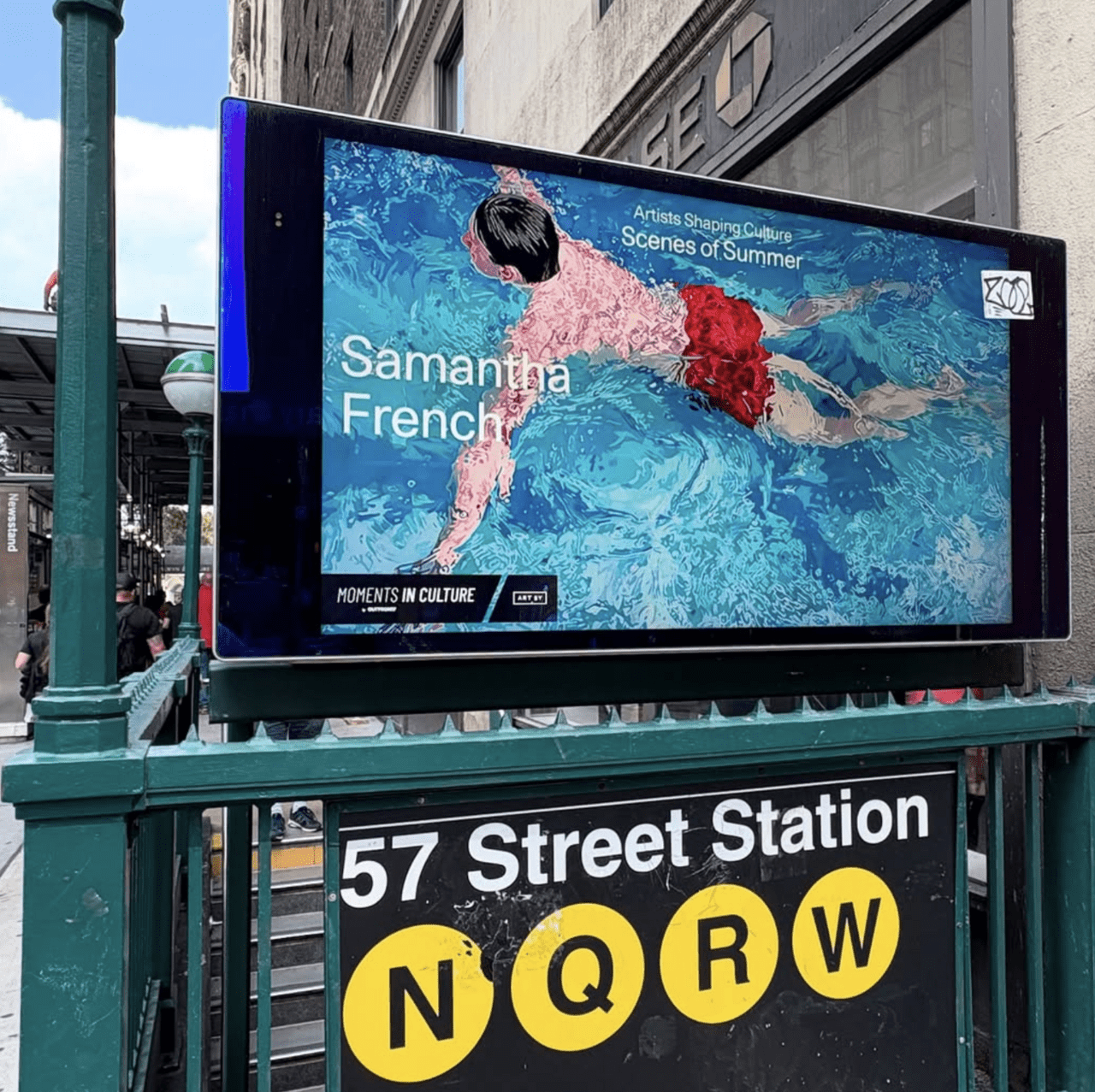 A photograph of Samantha French's Work, Cool and Wet, on display above New York's 57 Street Station.