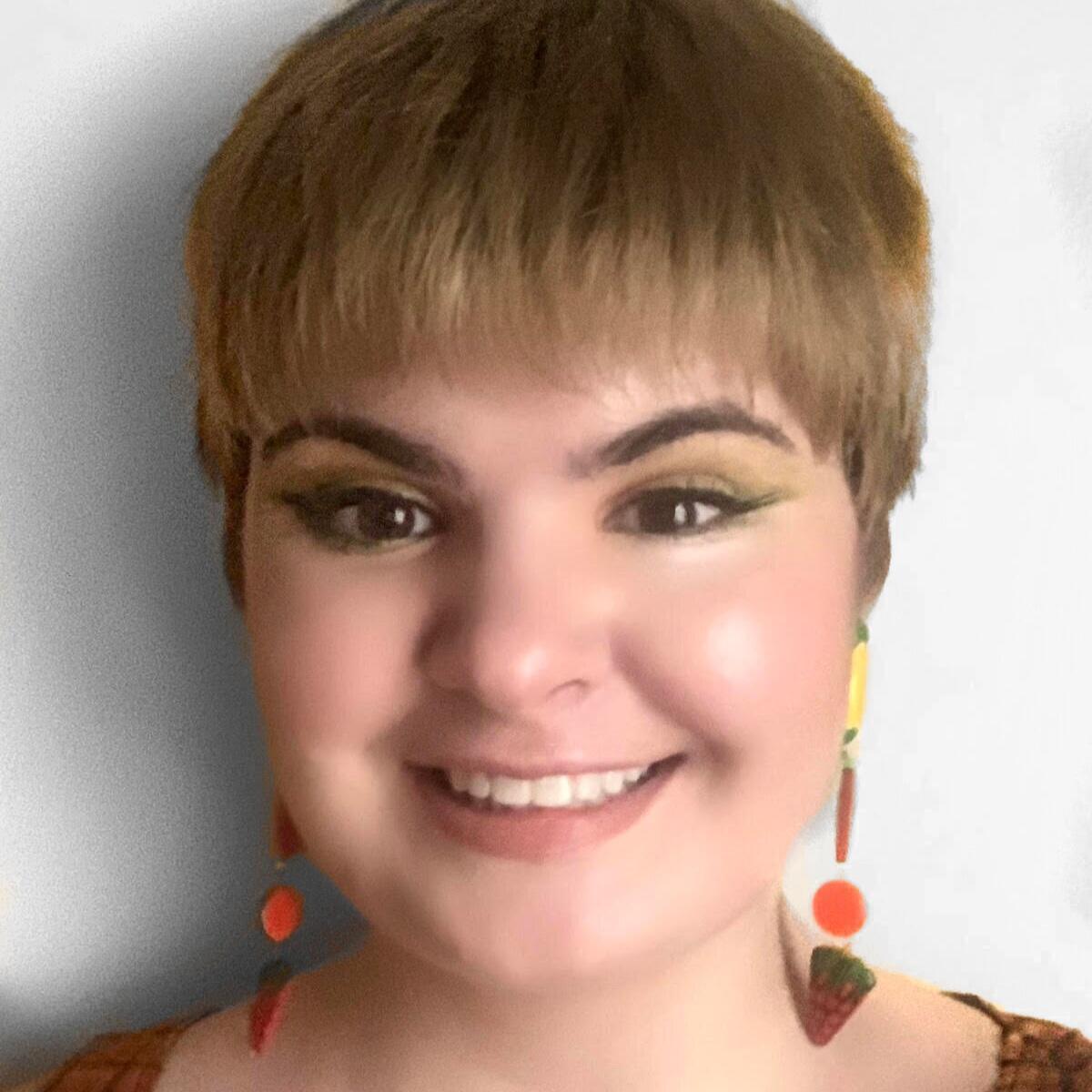Headshot of Sarah Maude-Griffin.