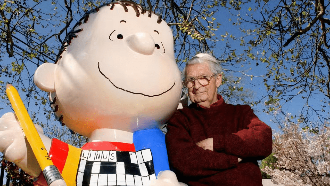 Linus Maurer with statue of Linus van Pelt