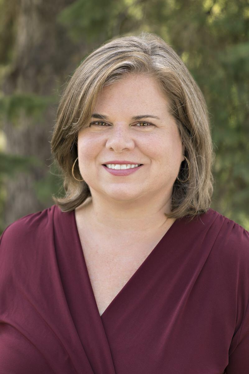 A portrait headshot of Julie Dirksen.