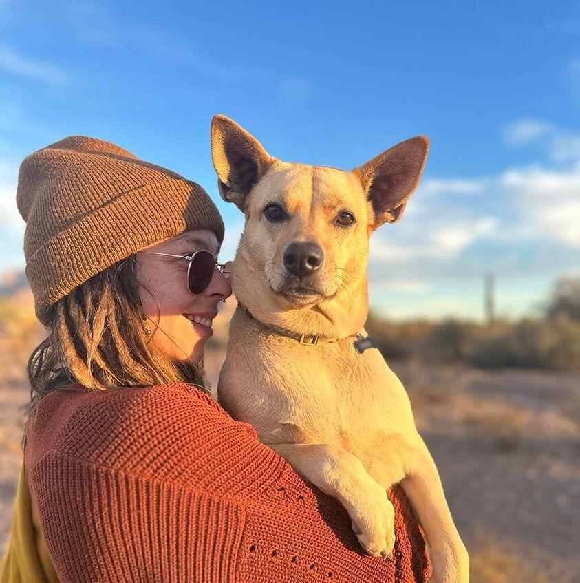 Headshot of Abbi Ren and her dog.