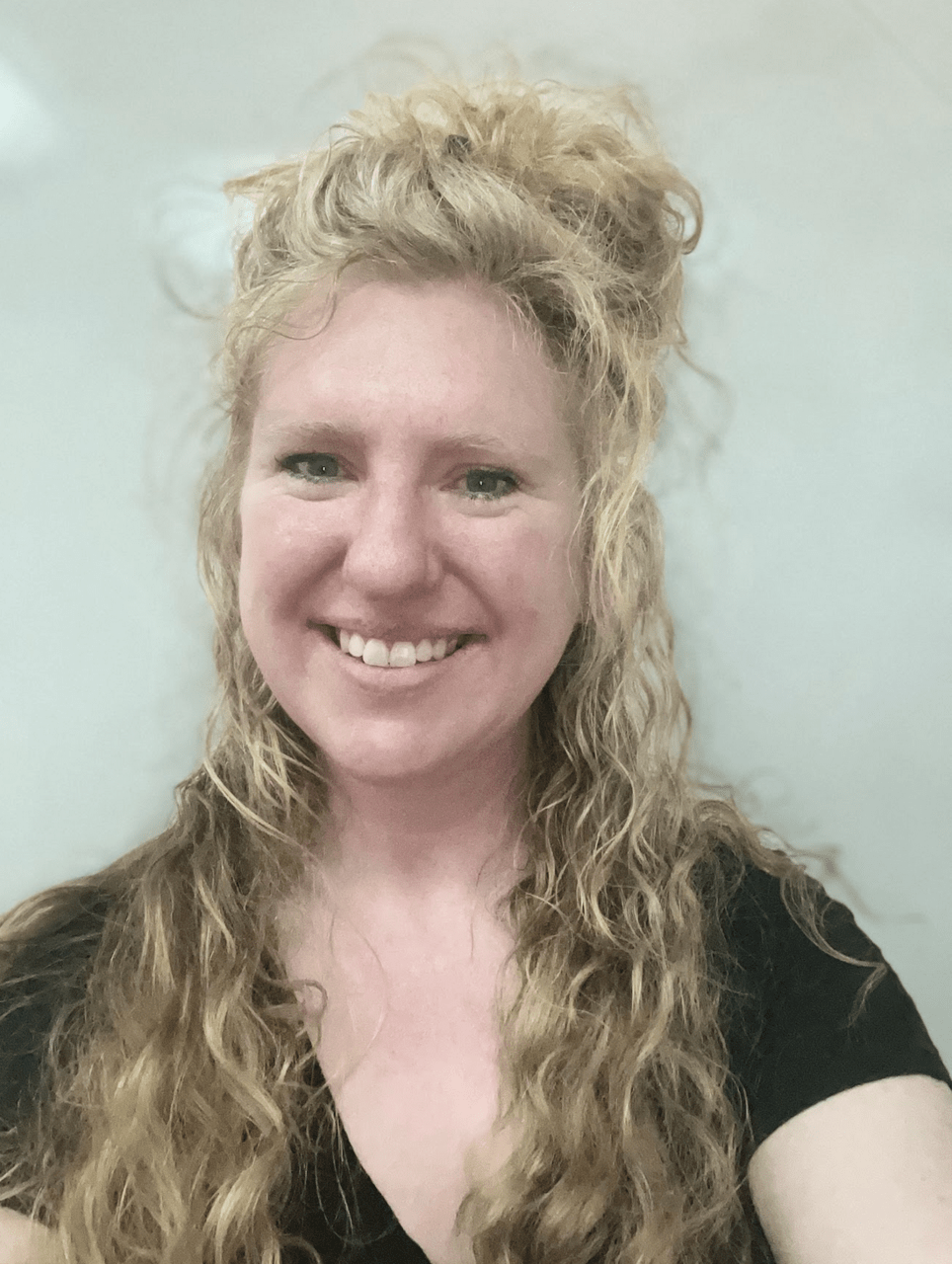 A headshot of Marie Aceituno.