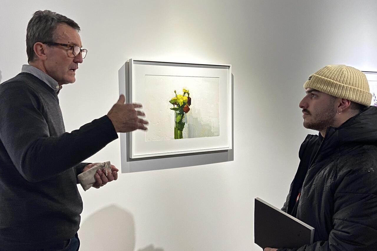 Fiko Insel asking and Artist a question in New York.