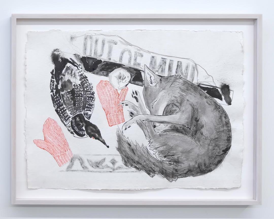 A fox huddled next to a loon and red mittens ontop of and "ICE out of Minnesota" bannister.
