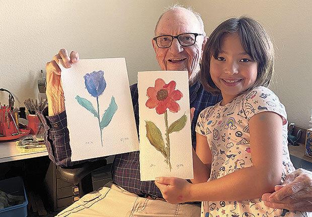 Frank Kuettel with his Granddaughter.