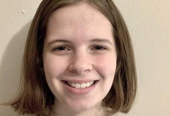 Headshot of Sydney Hollingshead.